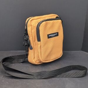Crooks & Castle's  Mens Mustard Yellow Nylon Crossbody Bag.